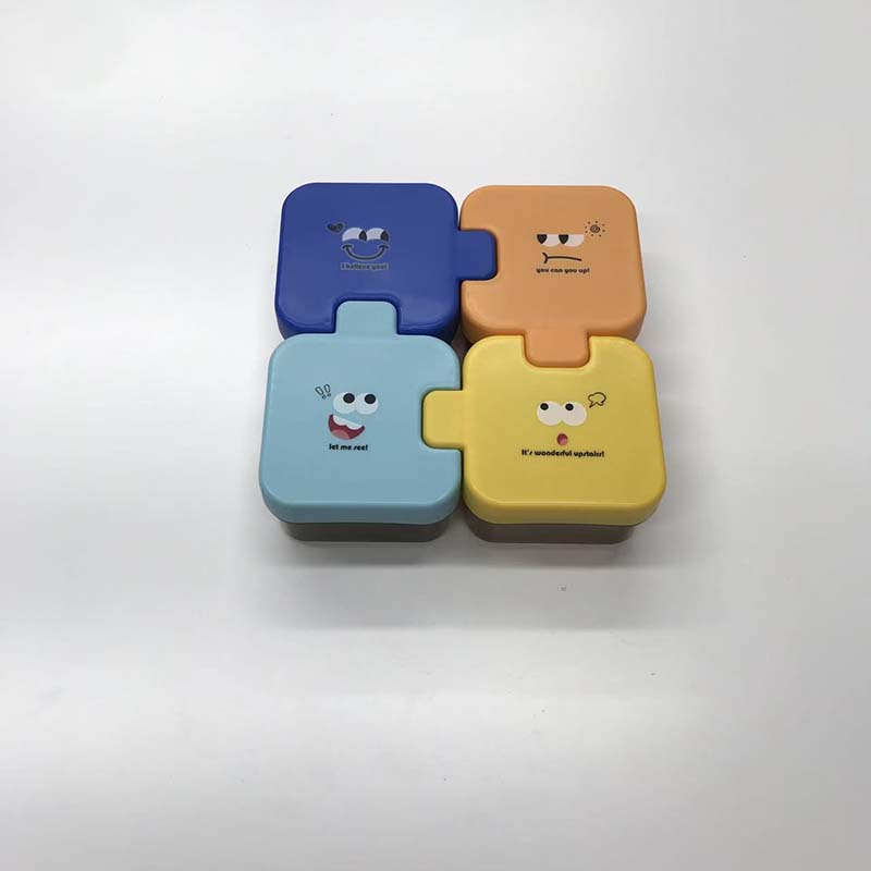 Puzzle shaped portable lunch box